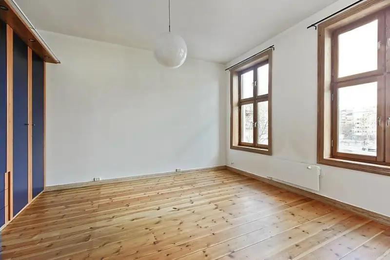 A tropical bedroom virtually staged from an empty room with AInteriors virtual staging tool for interior design.